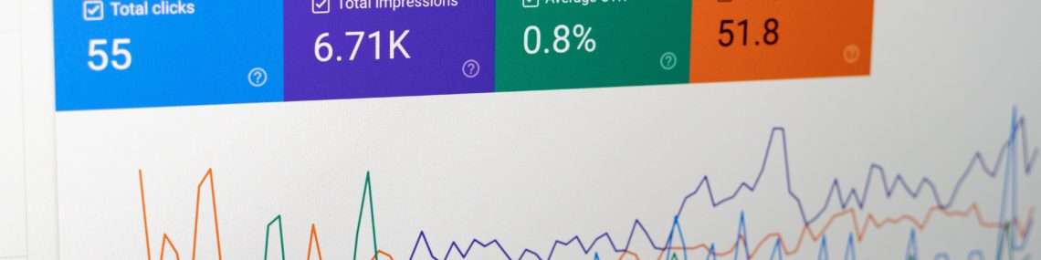 computer screen with an analytics performance report showing clicks, impressions, CTR and average position