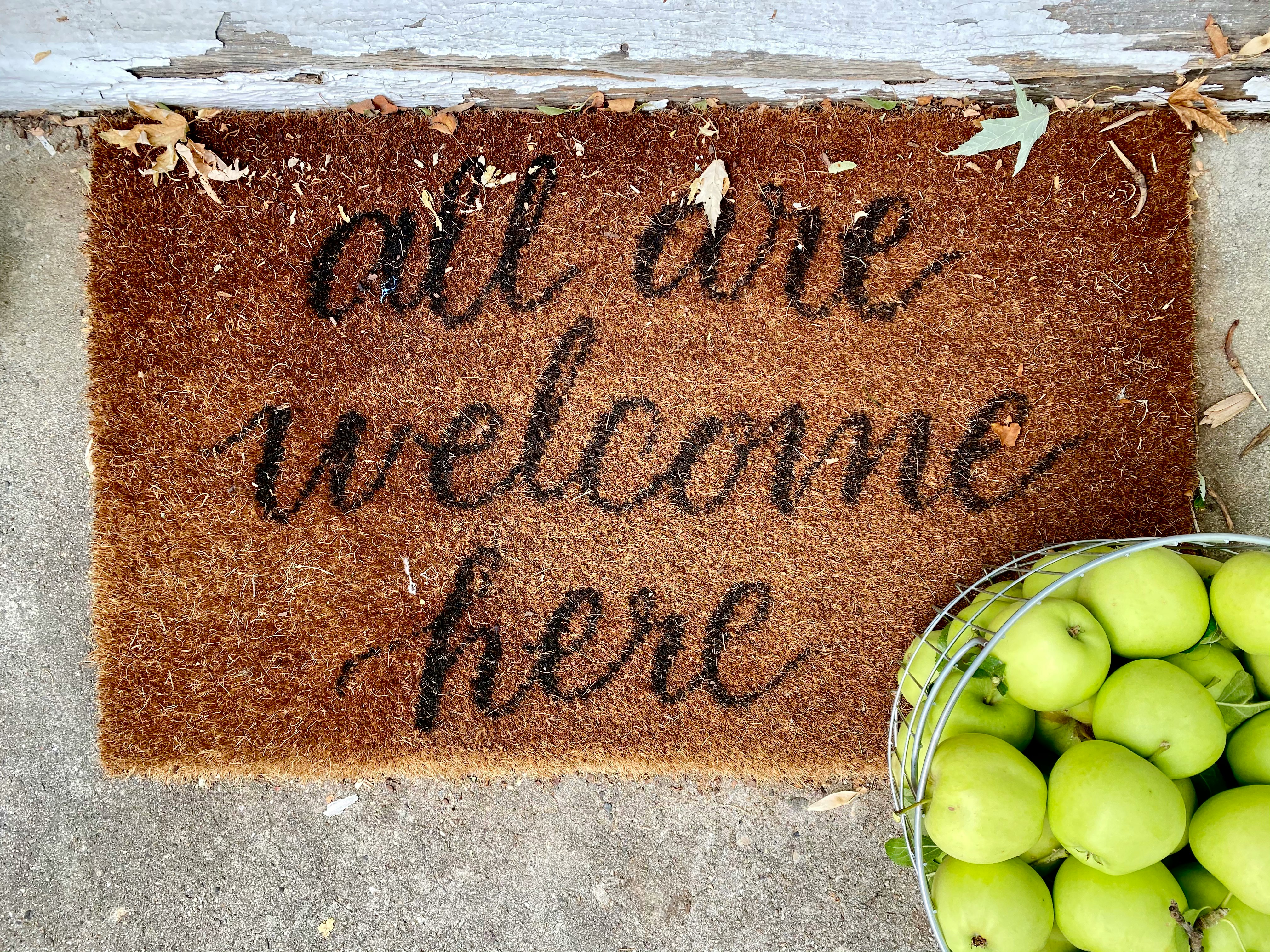 welcome mat saying all are welcome here. nonprofit digital branding