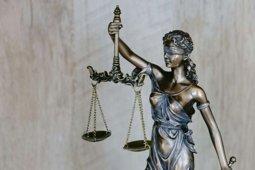 Lady Justice background.
balancing urgency and hope in nonprofit messaging