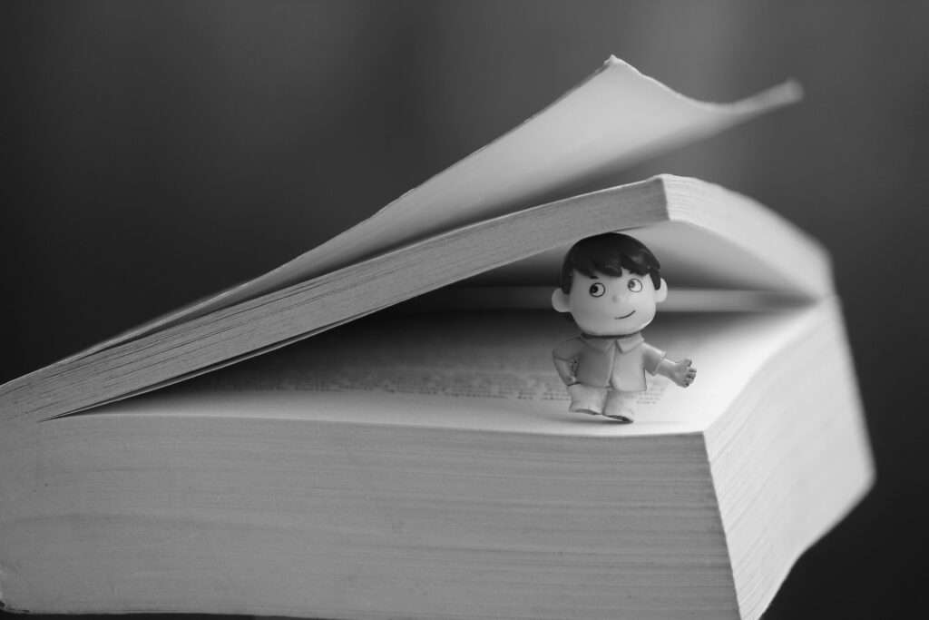 human-centered nonprofit storytelling 
small figure of a little boy set in the pages of a book